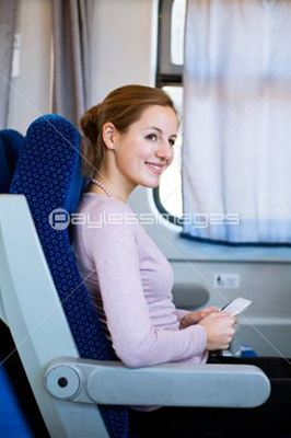 Young woman traveling by train Young woman traveling by train